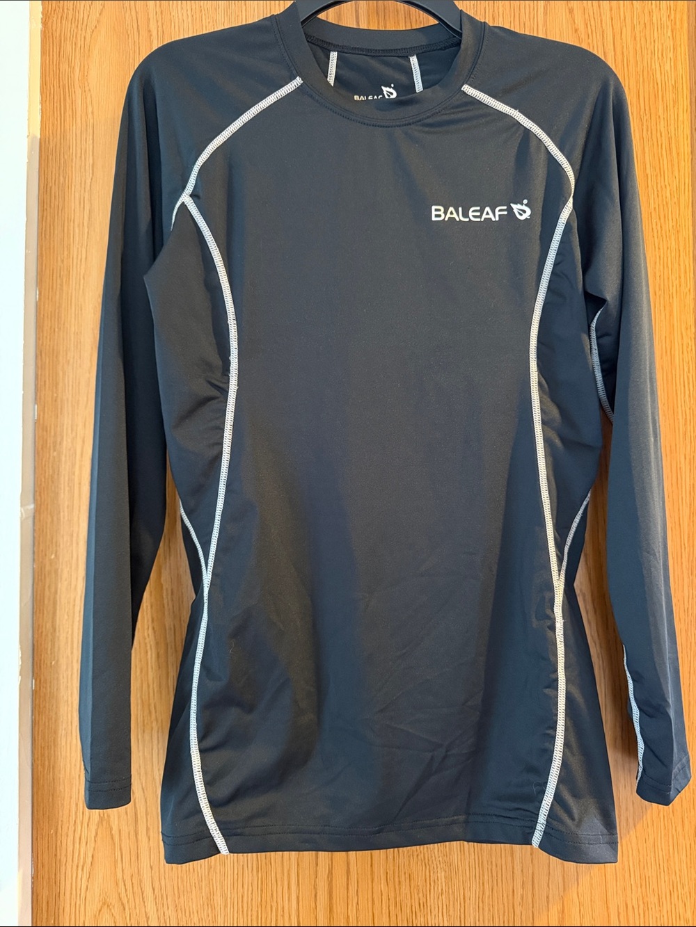 Baleaf Black Long Sleeve Performance Top with White Stitching